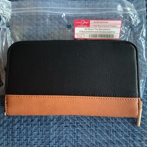 Brand new thirty-one Benjamin wallet